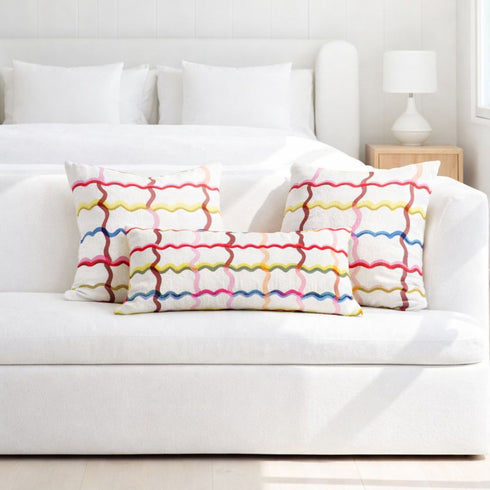 Roller Rink multicolor square lumbar throw pillows on couch - Shop cute decorative throw pillows by Kerri Rosenthal