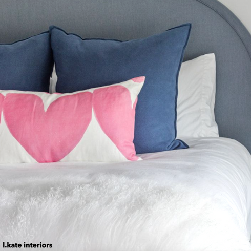 White ground with pop pink hearts Alotta Love cute throw pillows by Kerri Rosenthal