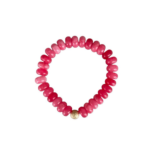 Seally Mimi fuchsia stone bead bracelet is made from smooth semi-precious stones. Tinted agate beads with an 18K gold bead is handmade in Switzerland.
