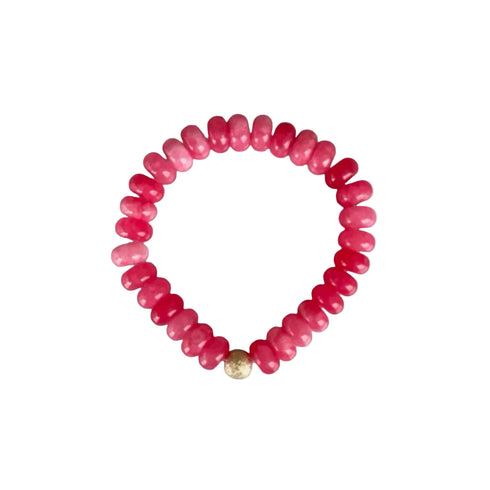 Seally Mimi fuchsia stone bead bracelet is made from smooth semi-precious stones. Tinted agate beads with an 18K gold bead is handmade in Switzerland.