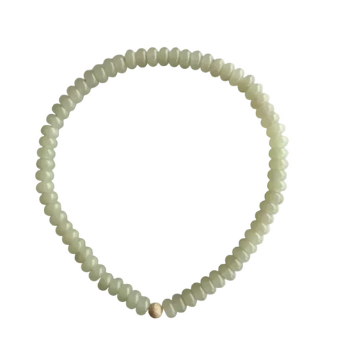 Seally Mimi pistachio glow green necklace is made from tinted quartz & a 18K gold-plated bead handmade in Switzerland