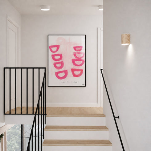 Staircase with black metal railing and pink abstract art on white wall by Kerri Rosenthal