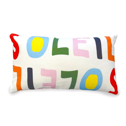 Colorful lumbar throw pillow with "soleil" abstract letter design on a white background