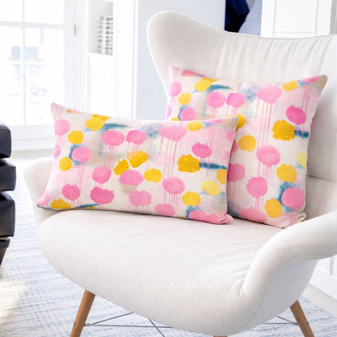 White chair with colorful polka dot cushions in a bright room - Square and rectangular lumbar decorative throw pillow by Kerri Rosenthal