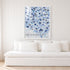 Kerri Rosenthal Starry Starry Love Vertical Art Print styled above white sofa — living room wall art inspiration.