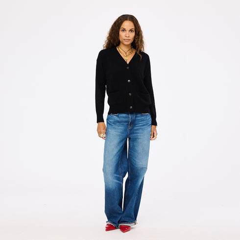 The Jackie button-front black cardigan is made from 100% cashmere with a V-neck and double pockets - Shop cute women’s cardigans by Kerri Rosenthal