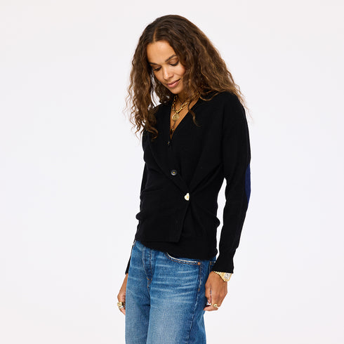 The Jackie button-front black cardigan is made from 100% cashmere with a V-neck and double pockets - Shop cute women’s cardigans by Kerri Rosenthal