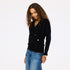 The Jackie button-front black cardigan is made from 100% cashmere with a V-neck and double pockets - Shop cute women’s cardigans by Kerri Rosenthal