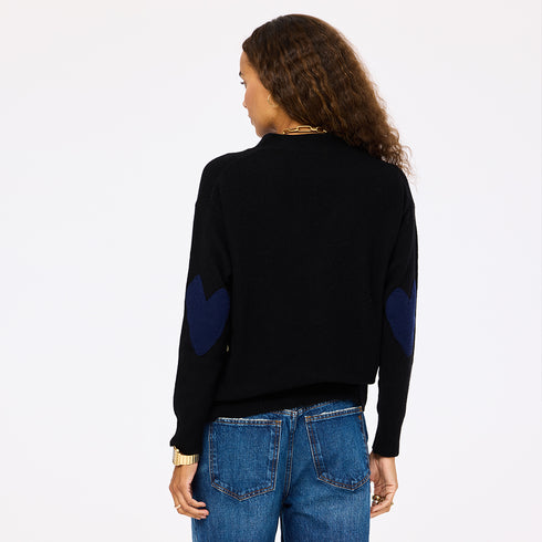 The Jackie button-front black cardigan is made from 100% cashmere with a V-neck and double pockets - Shop cute women’s cardigans by Kerri Rosenthal