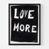 "Love More" A black and white framed original word wall art painted by Kerri Rosenthal