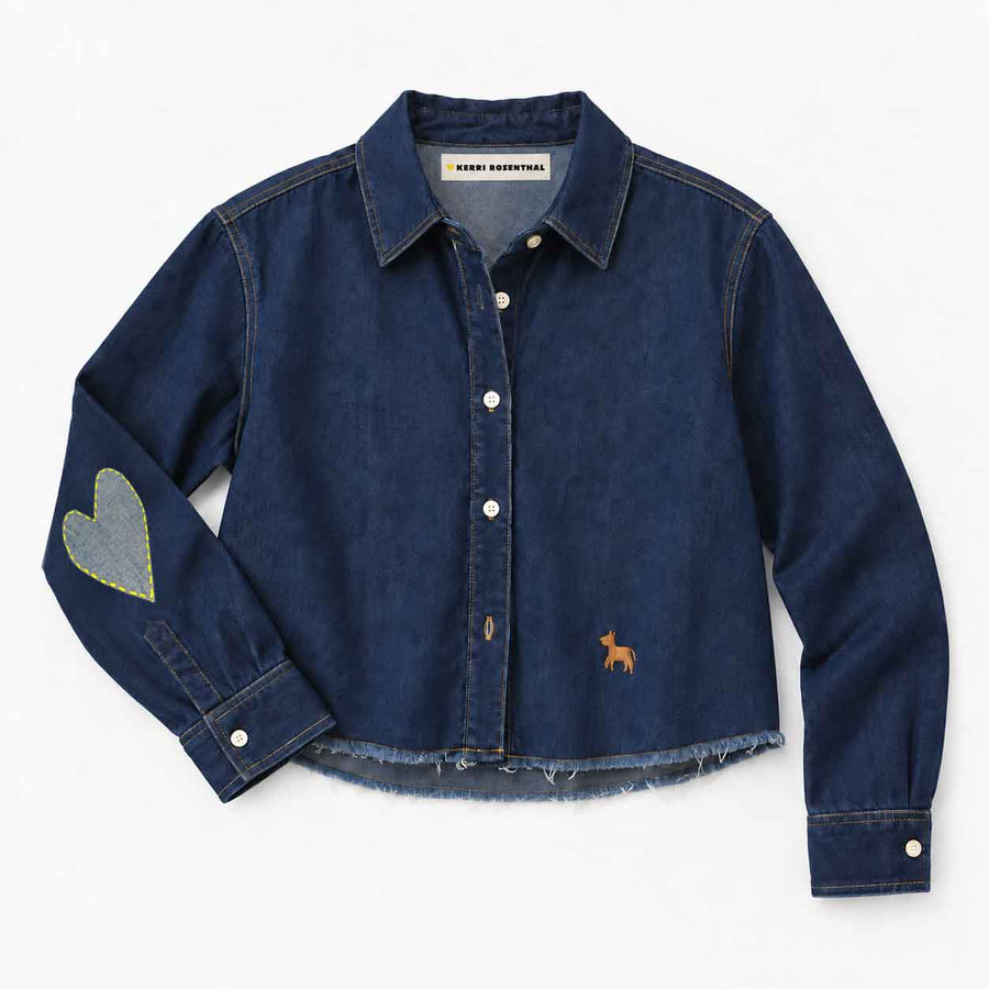Love Reigns Shirt with contrast stitching and "Love Reigns" embroidery at the front, flat shot