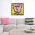 Tiki Miniki multicolor abstract wall art print with throw pillows on couch - Shop unique wall artwork decor for the living room by Kerri Rosenthal