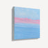 Side angle view of unframed abstract seascape canvas art, showing gallery-wrap texture with soft blue and pink coastal tones