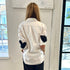 White Mia long sleeve button-up shirt with black heart patch elbow sleeves - Cute designer fashion button-up shirts by Kerri Rosenthal