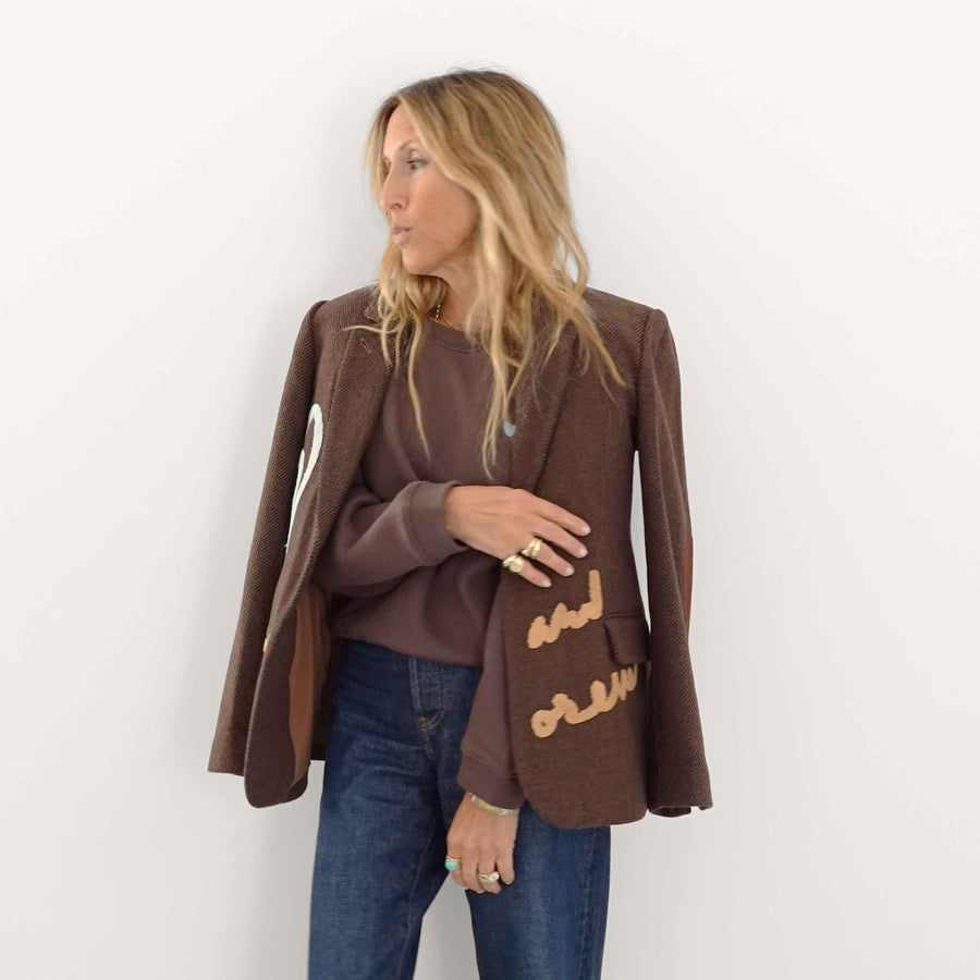 Kerri wearing Workday On and On Forever Blazer over shoulders.