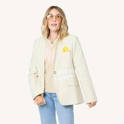Workday Love Rises single-breasted beige blazer in cotton blend with removable heart-shaped hanky and heart elbow by Kerri Rosenthal