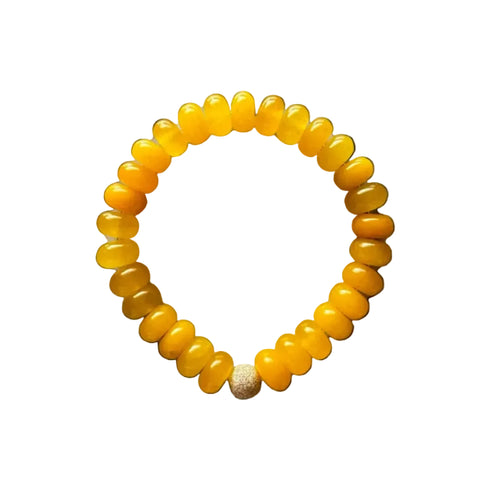 Seally Mimi yellow soleil monochrome bracelet is made from quartz & an 18K gold-plated bead. Handmade in Switzerland.
