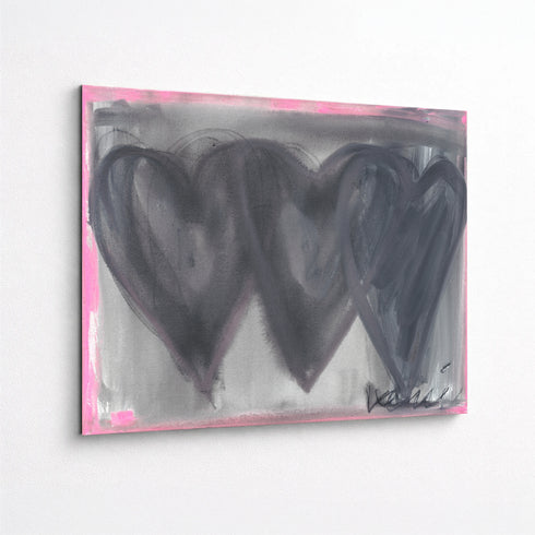 Close-up of hand-painted 3 black connecting hearts and gray and pink background texture and brushstrokes on Holding Hearts art print on aluminum by Artist Kerri Rosenthal.
