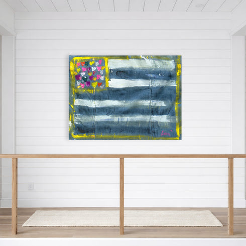 Abstract Flag canvas painting with blue, white, and multicolored heart design on a white background. Artwork by Kerri Rosenthal.