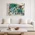Canvas abstract canvas painting by Kerri Rosenthal with teal, black and pink heart motifs above white sofa in light, paneled living room