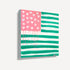 Kerri Rosenthal Heart-Flag canvas painting in pink and green: an American flag design with a pink star field filled with white dripping hearts and teal-green and white painted stripes.