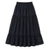 Black tiered maxi skirt with a smocked elastic waistband and a small heart embroidered near the hem. Womens clothing from Kerri Rosenthal