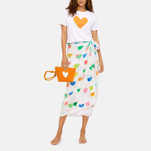 Suke Imperfect white heart t shirt in 100% cotton with sarong skirt and orange pouch. Shop women's cute graphic tees by Kerri Rosenthal