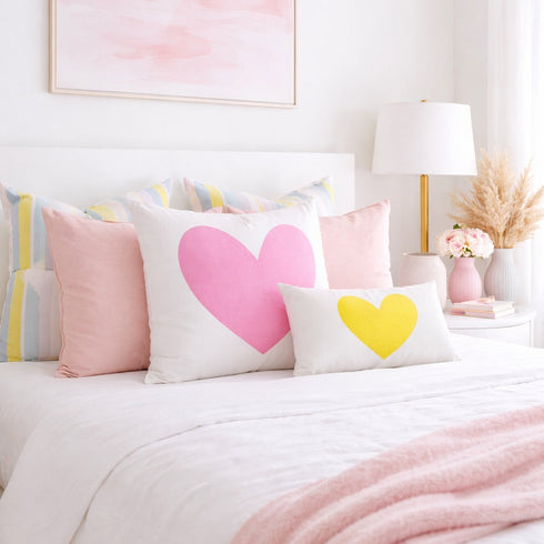 Imperfect Heart Throw Pillows - White with pink and yellow hearts design decorative pillow. Cute throw pillows for bed available in rectangular lumbar or square shape. Made in USA by Kerri Rosenthal.