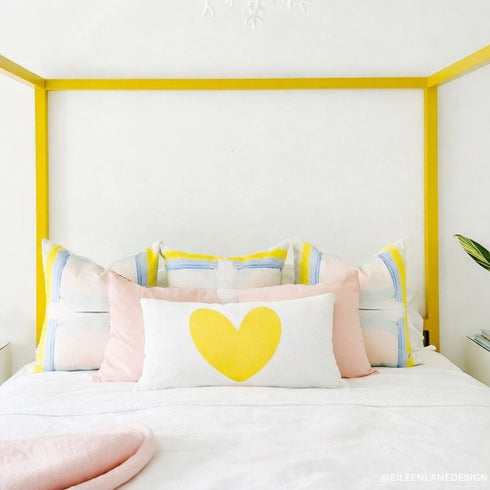 Imperfect Heart Throw Pillow - White linen with yellow heart design decorative pillow. Cute throw pillows for bed. Lumbar shape. Made in USA by Kerri Rosenthal