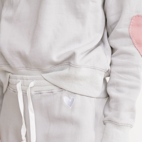 Grey oversized sweatshirt with pink heart patch women’s sweatshirts 100% cotton by Kerri Rosenthal