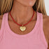 Kerri's puff heart necklace with plush gold heart pendant and genuine leather cord