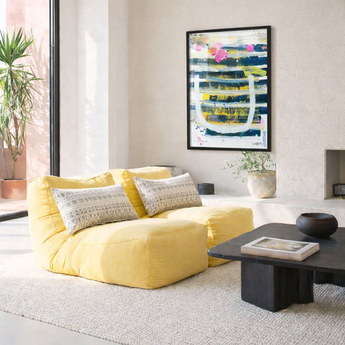 Laugh Lines colorful abstract wall art print artwork with cute throw pillows on chair by Kerri Rosenthal