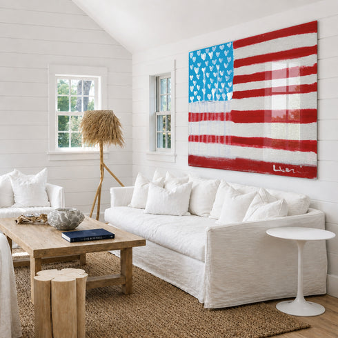 American Flag painting with Plexi Glass framing by Kerri Rosenthal featuring her signature Drippy Hearts motif as stars and shown inside a coastal family room