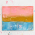 Postcard from the Pacific Coast original painting with a pink sky, golden shoreline, and turquoise water in a table