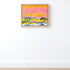 Close-up of Sunset Summer, an abstract original painting on canvas, framed in wood