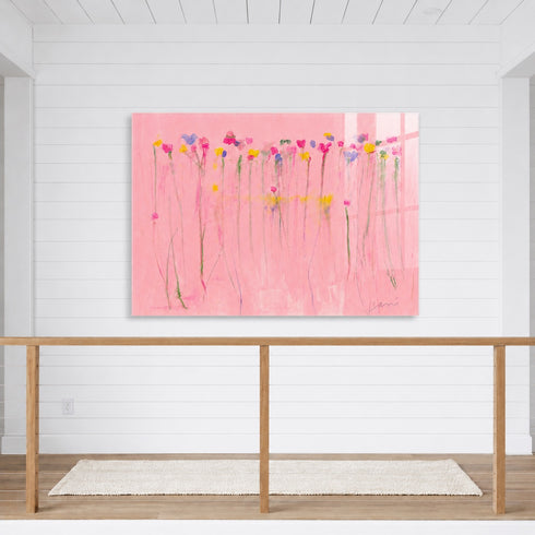 Kerri Rosenthal pink floral canvas print displayed on white shiplap wall above wood staircase railing