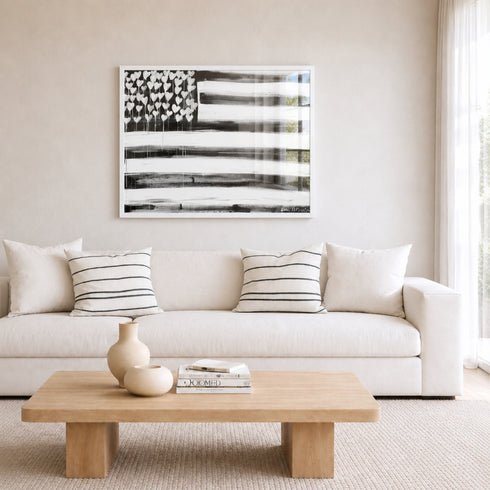 Love Has No Color black white art print by Kerri Rosenthal inside a modern living room
