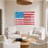 Living room with white furniture, a Prada book, and an American flag painting with Drippy Heart stars by Kerri Rosenthal