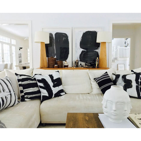 Black carbon Nineteen cute decorative square throw pillows on couch by Kerri Rosenthal