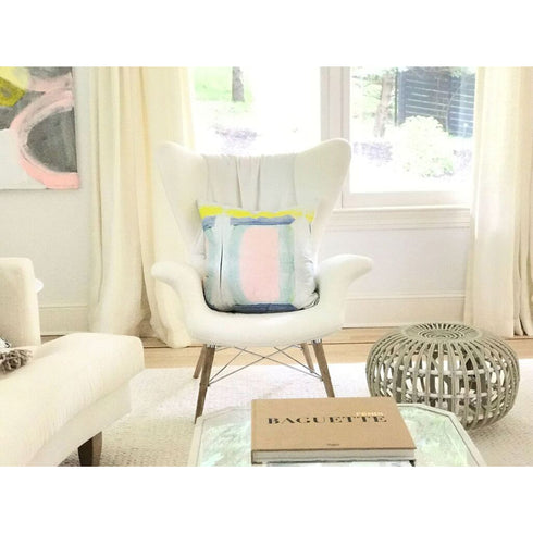 Colorful multi Twenty Eight cute square decorative throw pillows on chair by Kerri Rosenthal