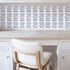 Trendy and good quality white ground & indigo blue dots and stripes 14 Layers wallpaper on accent wall by Kerri Rosenthal