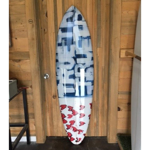 Custom red, white, and blue surfboard signed by kerri rosenthal