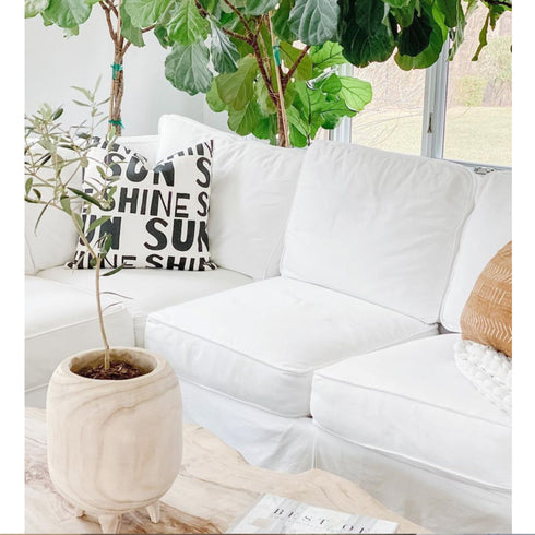 White ground with black carbon Sunshine cute square decorative throw pillows on couch by Kerri Rosenthal