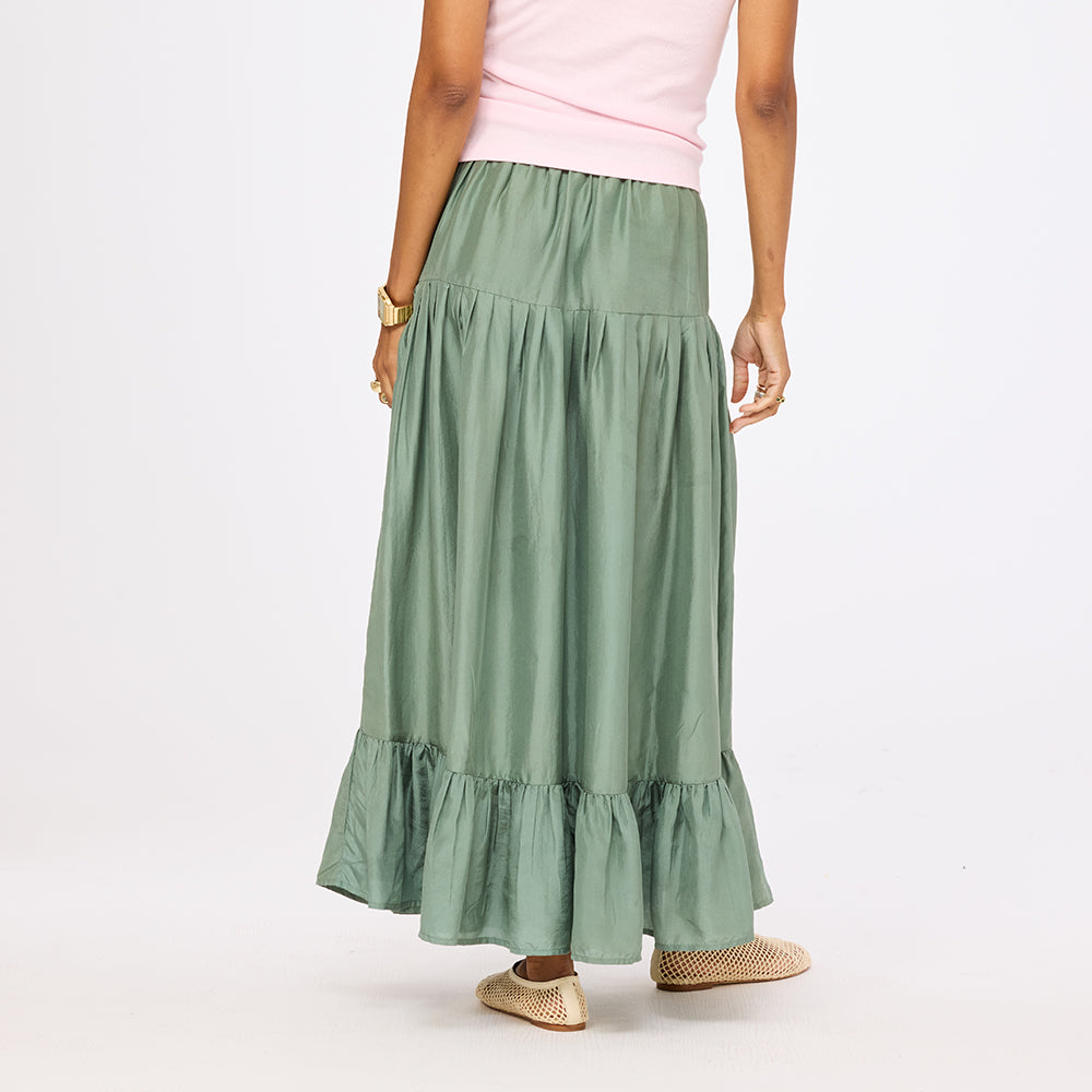 Women's amalfi green tiered maxi skirt side view. Shop Kerri Rosenthal skirts