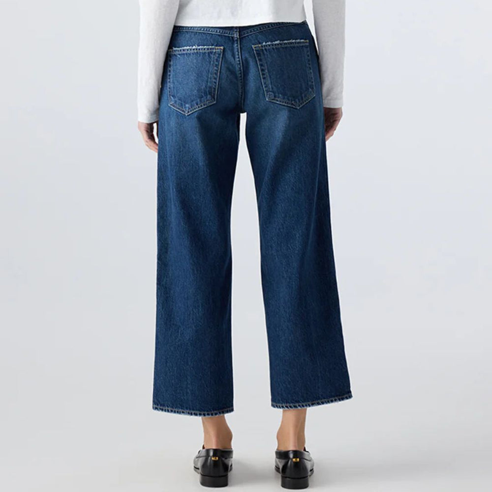 The Billie Jean is a mid-rise, cropped, wide, straight-leg jeans with an easy fit. A relaxed look, with distressing, dark 100% cotton rigid denim. Made in USA.
