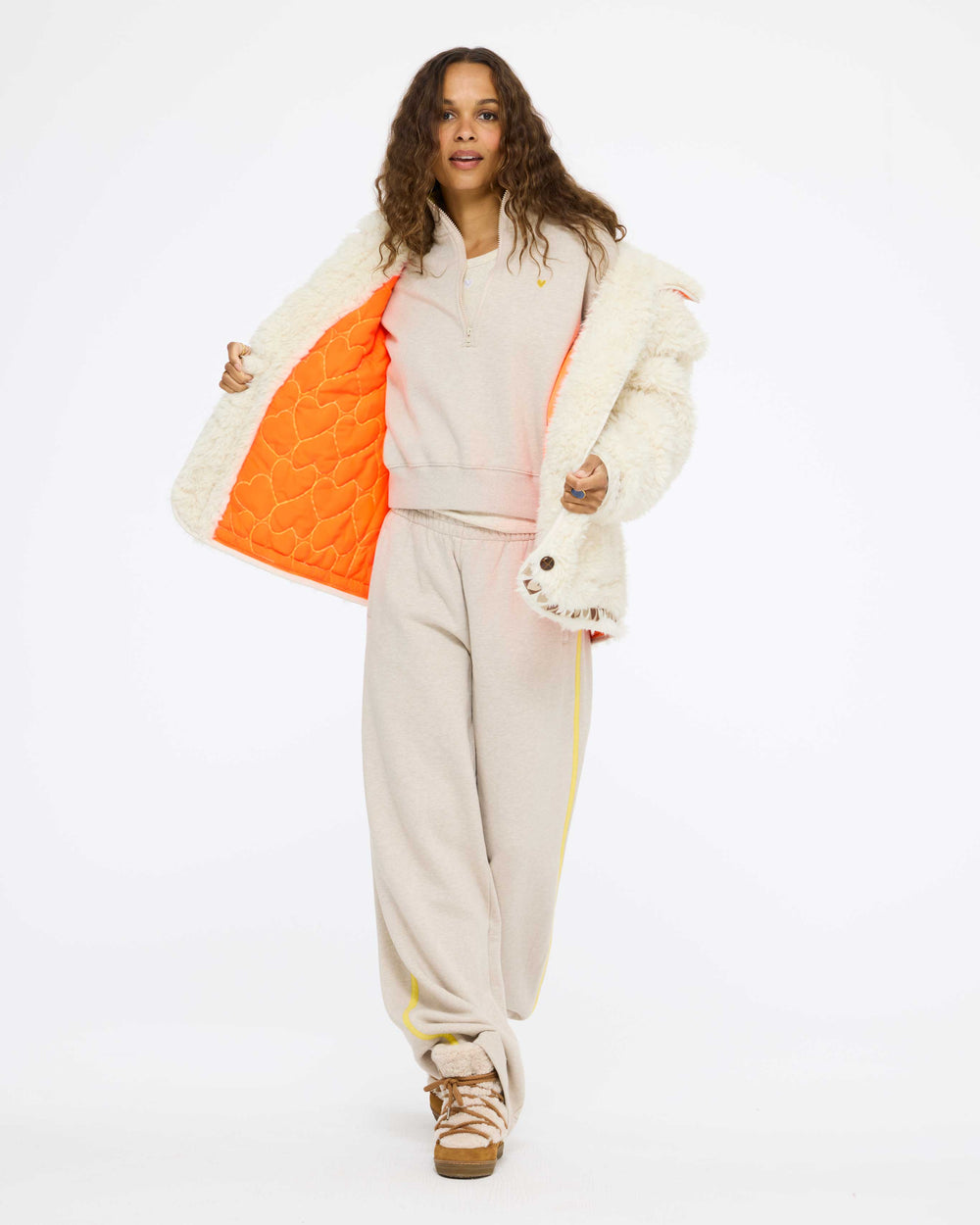 Model wearing the Cloud Nine Jacket in cream open over the Sunday Quarter Zip Sweatshirt and the Super Soft Fleece Weekend Palazzo in taupe heather, full length front view