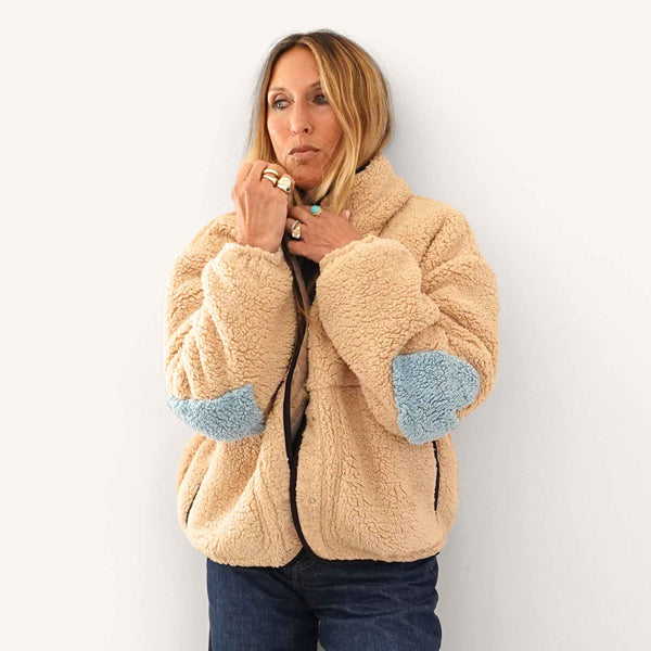 Kerri wearing the Coe Magoze flashing heart elbow patches.