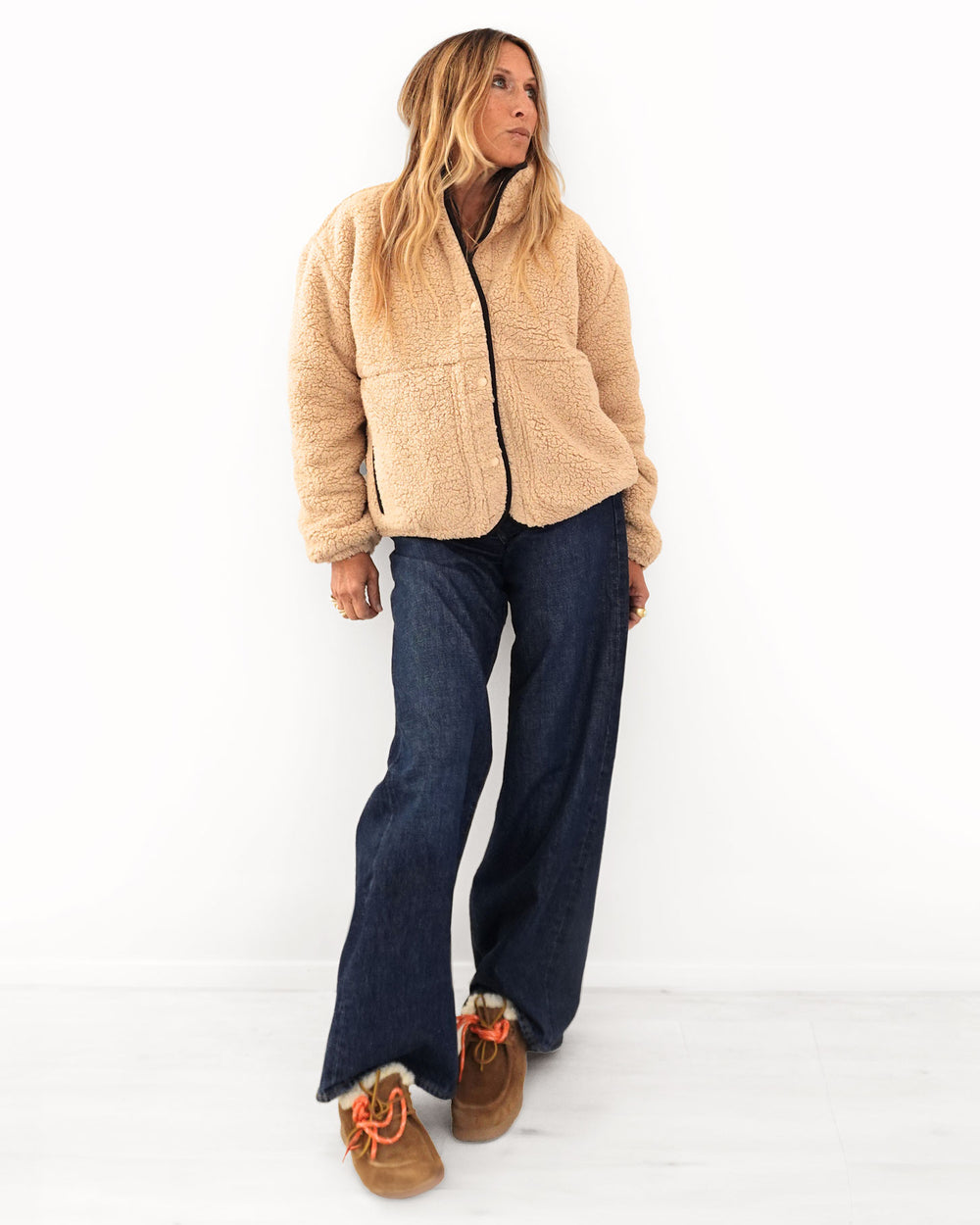 Kerri wearing the Coze Magoze Jacket in Teddy Brown, styled with dark jeans