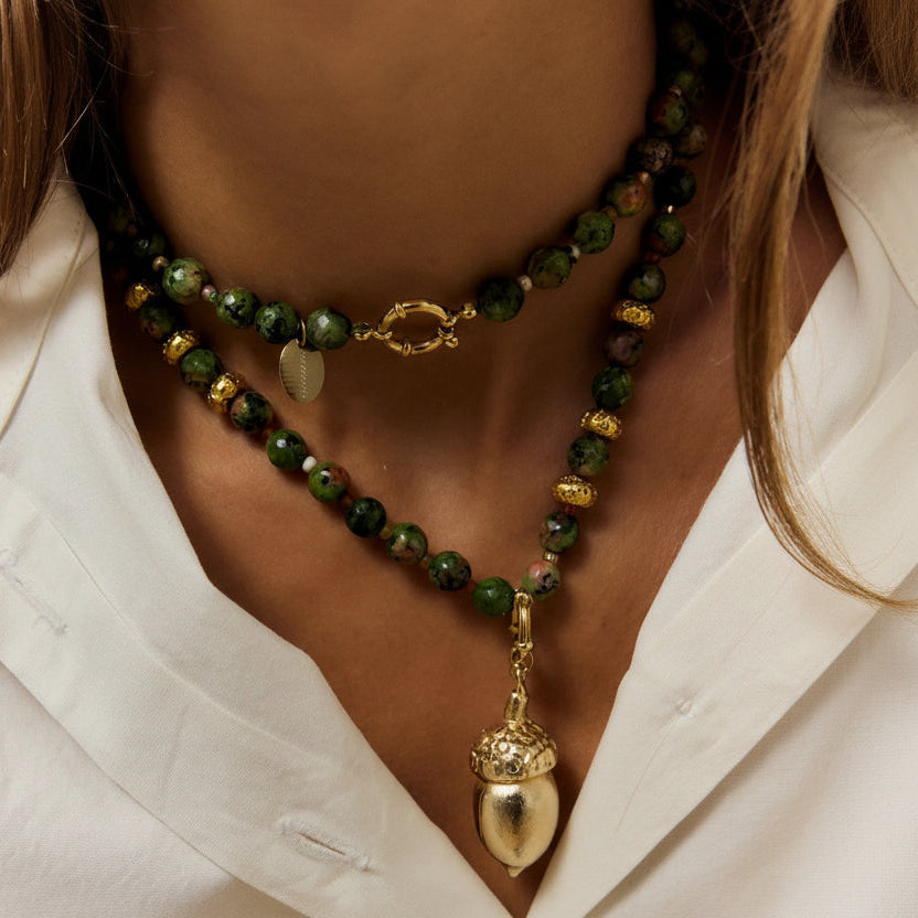 Bellota Dorada multicolor necklace with handcrafted agate bead and a gold-painted bronze charm by Kerri Rosenthal