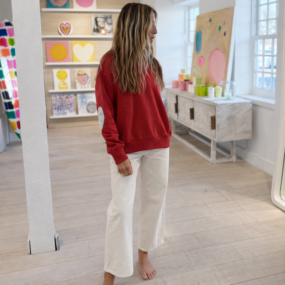 Washed Red Ex-Boyfriend Patchwork Sweatshirt by Kerri Rosenthal in 100% cotton loop terry with heart elbow patches, styled view